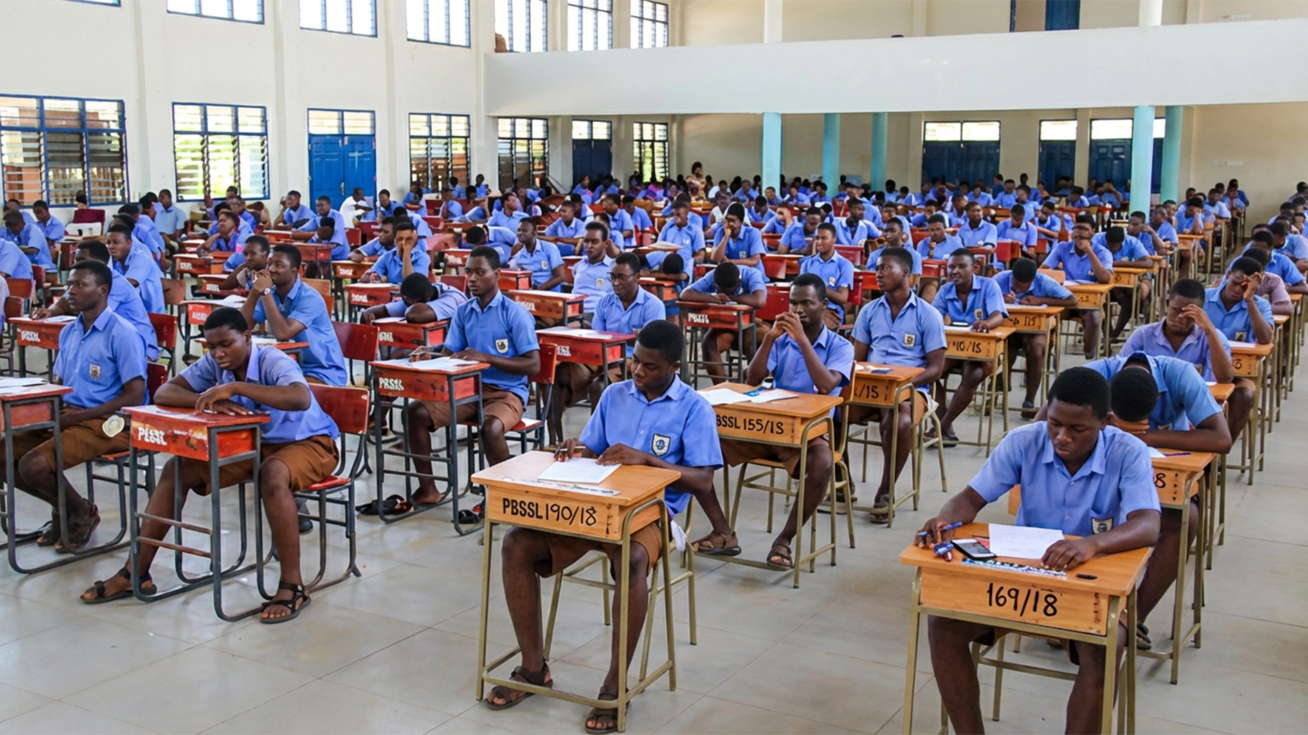 Students writing SSCE