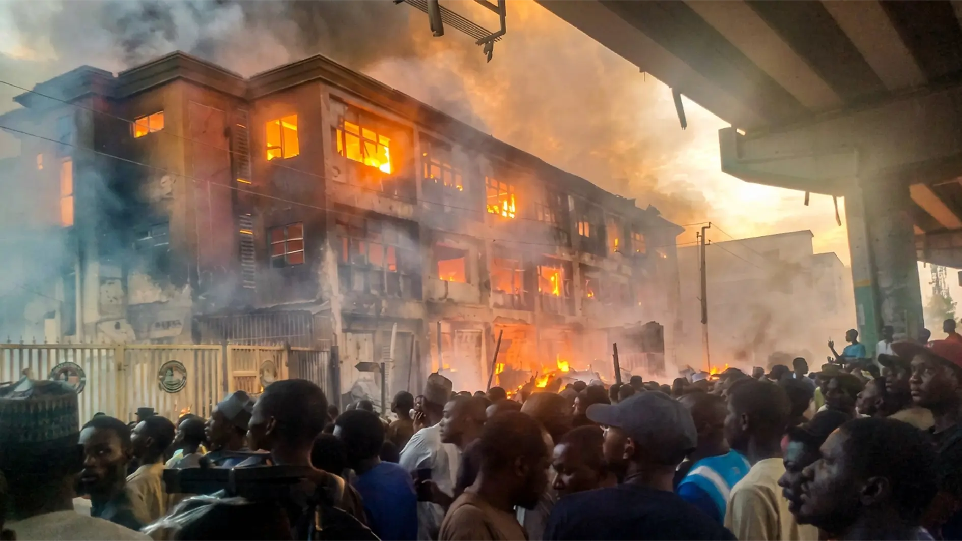 Sympathisers at the scene of the fire.