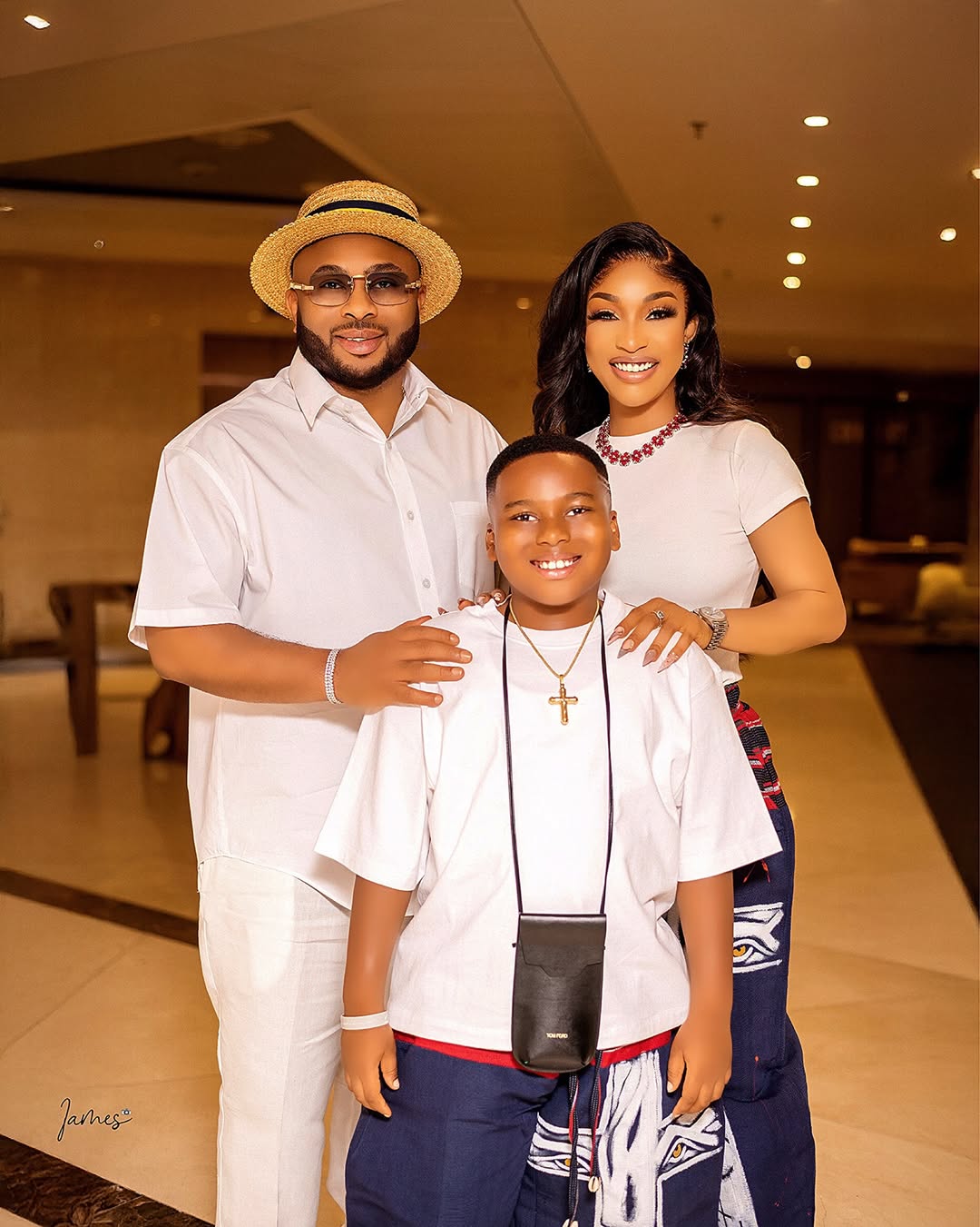 A family photo shows Tonto Dikeh standing with Olakunle Churchill and their son, King Andre, in coordinated outfits indoors.