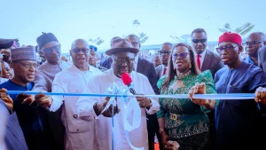 Delta State Governor, Sheriff Oborevwori (middle), cutting the ribbon to commission the ultra modern faculty of Environmental Sciences building, University of Delta, Owa-Alero Campus on Friday, while the former Acting Executive Secretary, National Universities Commission (NUC), Chris Maiyaki (left), Deputy Governor, Sir Monday Onyeme (2nd left), and immediate past Governor of the State, Senator Ifeanyi Okowa (right) look on.				                   PHOTO: BRIPIN ENARUSAI