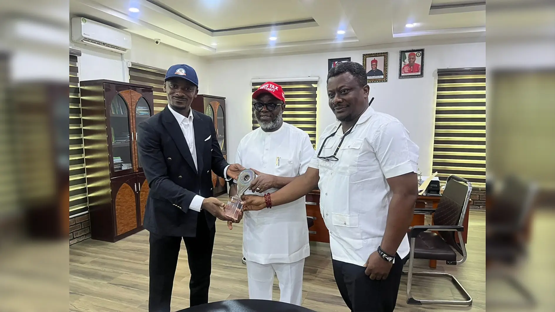 (From left) Training Officer Comrade Stanley Okafor, Dr. Greg Ezeilo (FCA) and Comrade Chikeize.