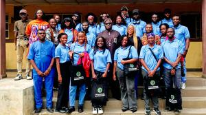 Students of the MultiChoice Talent Factory Acting Academy with the Executive Director of the NFVCB, Dr Shaibu Husseini (middle), at the end of their visit.
