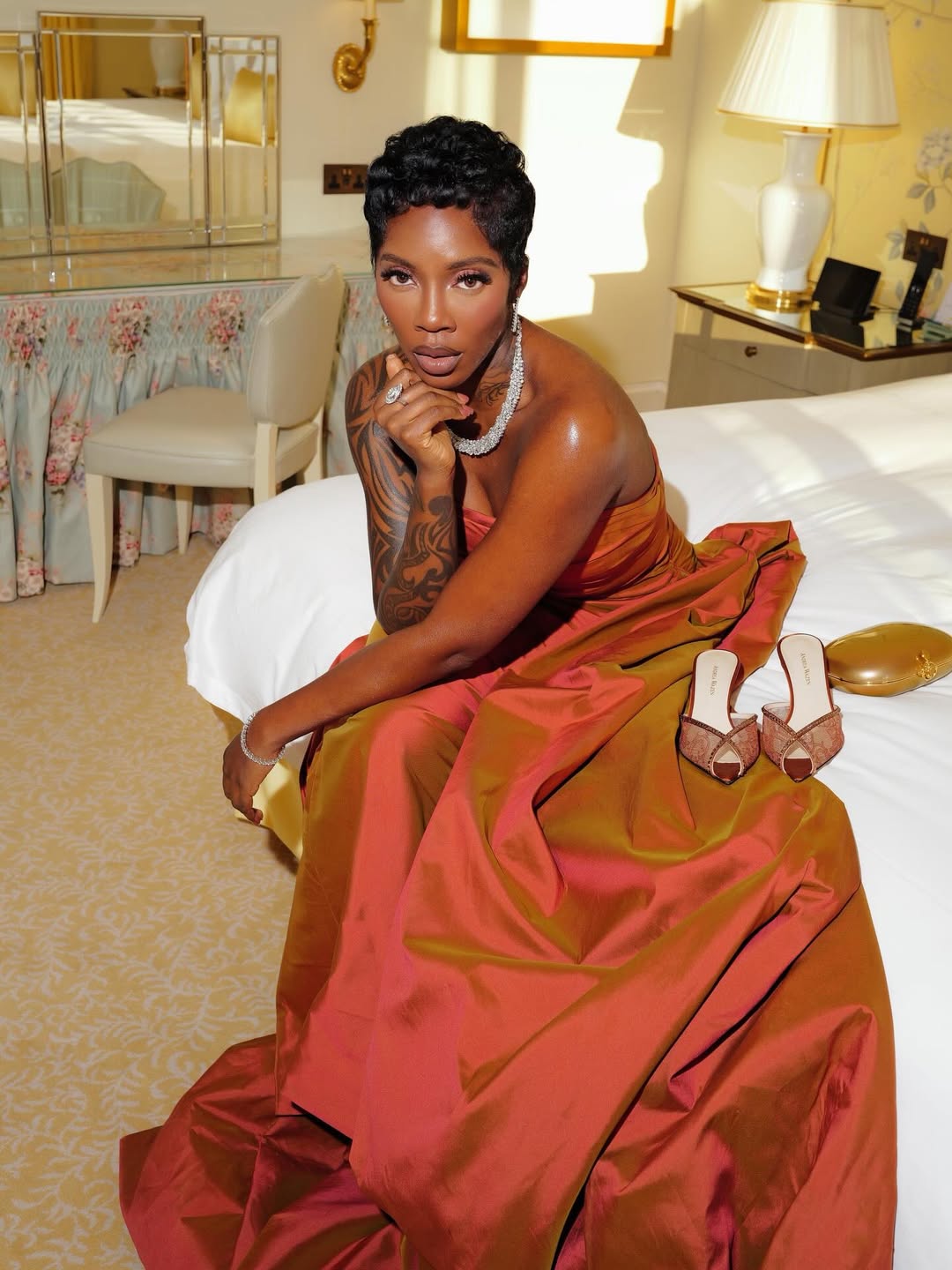 Tiwa Savage poses in a stylish outfit ahead of attending the UK state dinner hosted by King Charles III in honour of President Bola Tinubu.