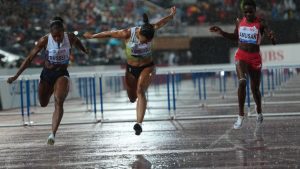 Amusan (right); reigning world champion,  Kambundji (middle) and Olympic champion, Russell.