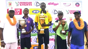 Director of Study, Ferscoat International School, Felix Opata (right); Representative of Green House (Third Position), Aborisade Peace; Representative of Yellow House (First Position), Iwasokun John; Representative of Purple House (Second Position),Victor Uirtuou, and Father of the Day, Olu of Ipasa Kingdom, Oba Kolawole Egundipe, at the presentation of awards to winners at the 13th Biennial Inter-House Sports Competition of  Frescoat International School, Ipaja, Lagos.