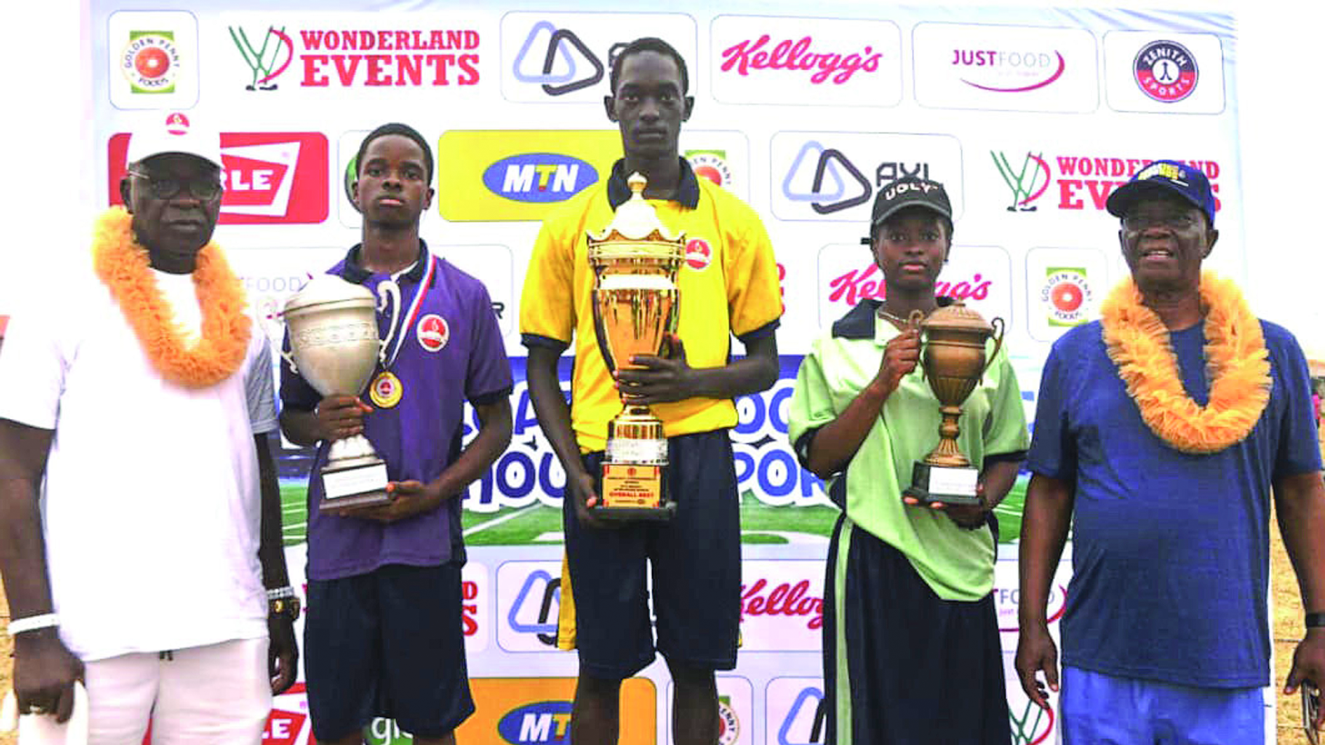 Director of Study, Ferscoat International School, Felix Opata (right); Representative of Green House (Third Position), Aborisade Peace; Representative of Yellow House (First Position), Iwasokun John; Representative of Purple House (Second Position),Victor Uirtuou, and Father of the Day, Olu of Ipasa Kingdom, Oba Kolawole Egundipe, at the presentation of awards to winners at the 13th Biennial Inter-House Sports Competition of  Frescoat International School, Ipaja, Lagos.