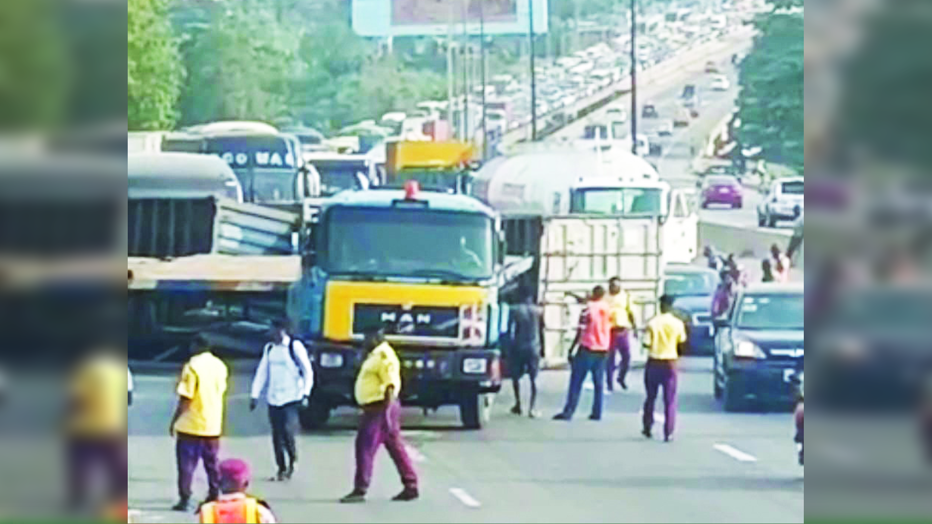 Commuters lament long hours on Lagos-Ibadan road as 20ft containers fall on Otedola Bridge - The Guardian Nigeria by Eniola