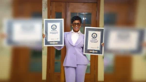 Tacha with her Guinness World Records plagues
