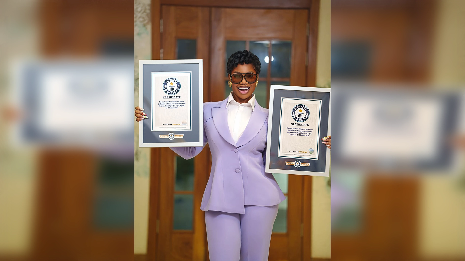 Tacha with her Guinness World Records plagues