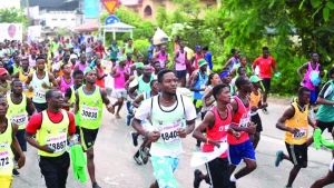 Runners scrambling for medals at the end of the 2026 Access Bank Lagos City Marathon.