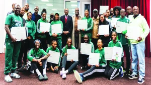 The D’Tigress displaying their property titles and national honours certificates in Lyon, France, yesterday