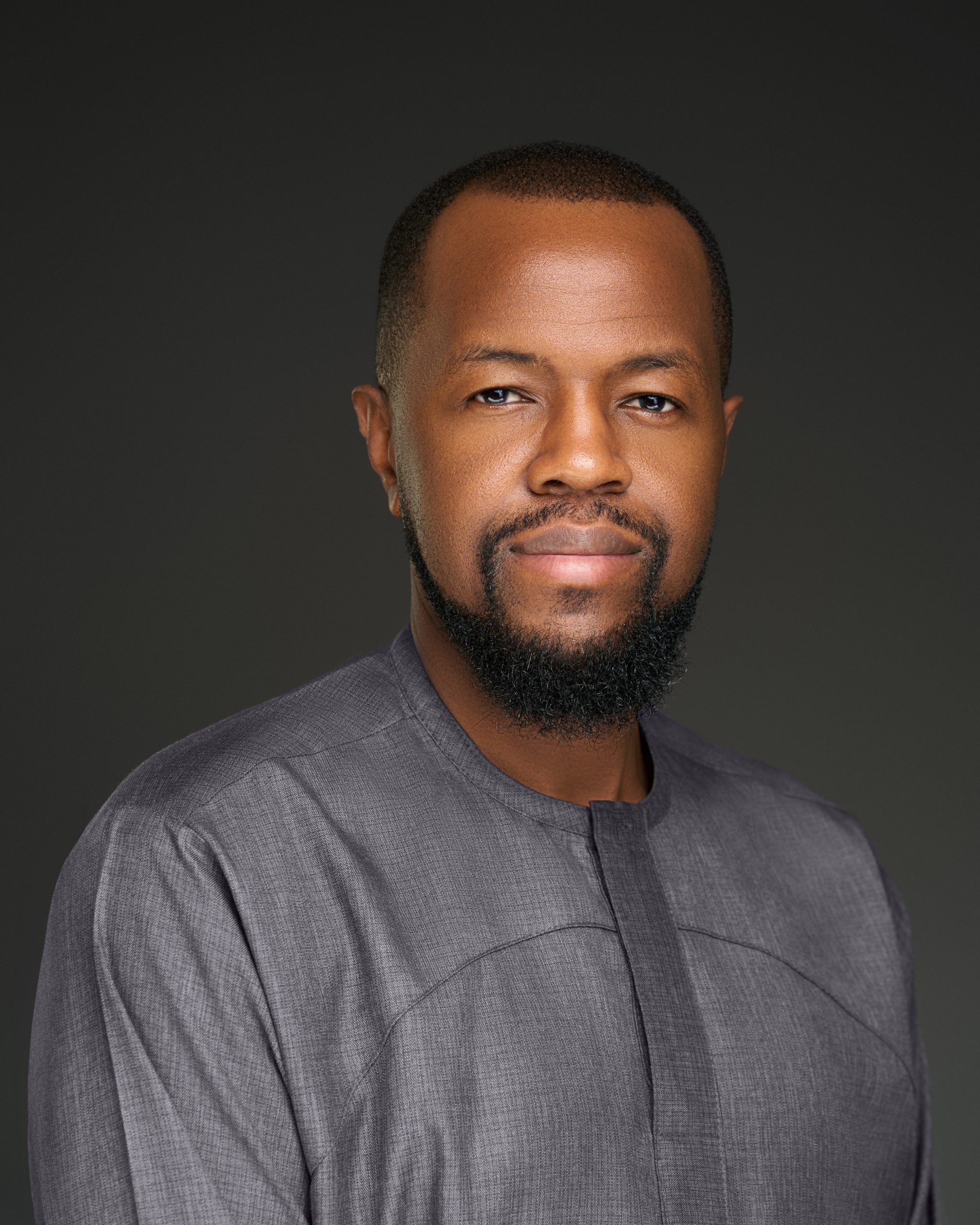 Portrait of Kene Okwuosa, Group Chief Executive Officer of Filmhouse Group.