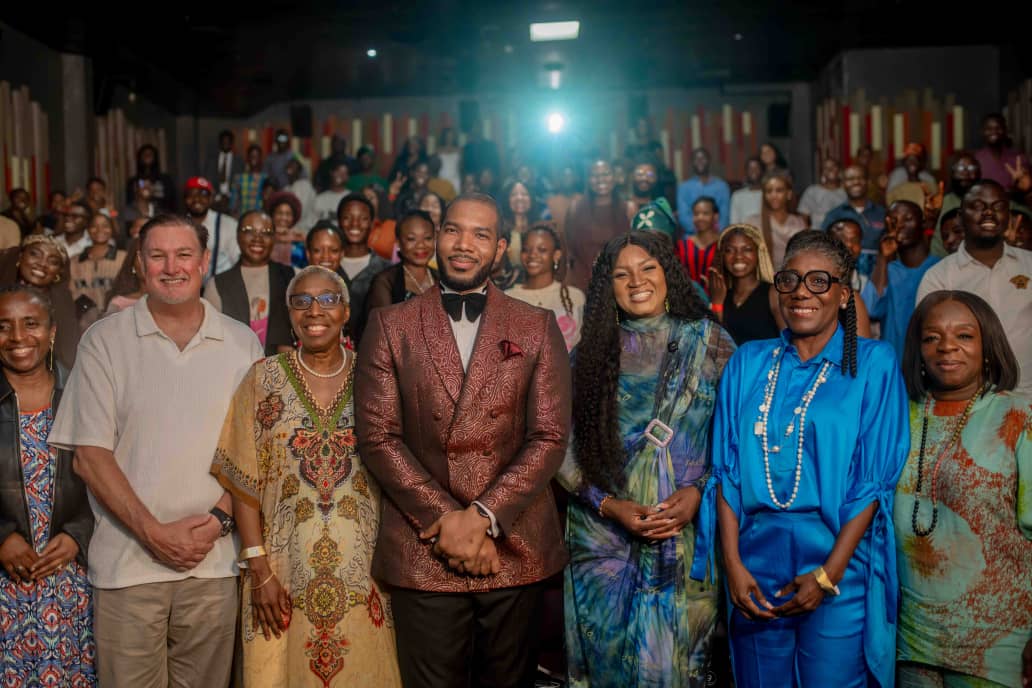 Omotola Jalade-Ekeinde poses with guests at the Mother’s Love film screening event in Lagos