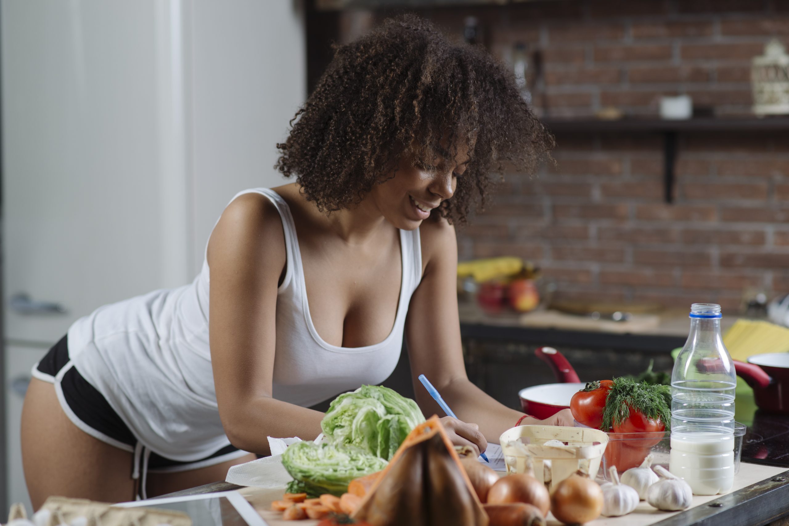 woman-writing-kitchen