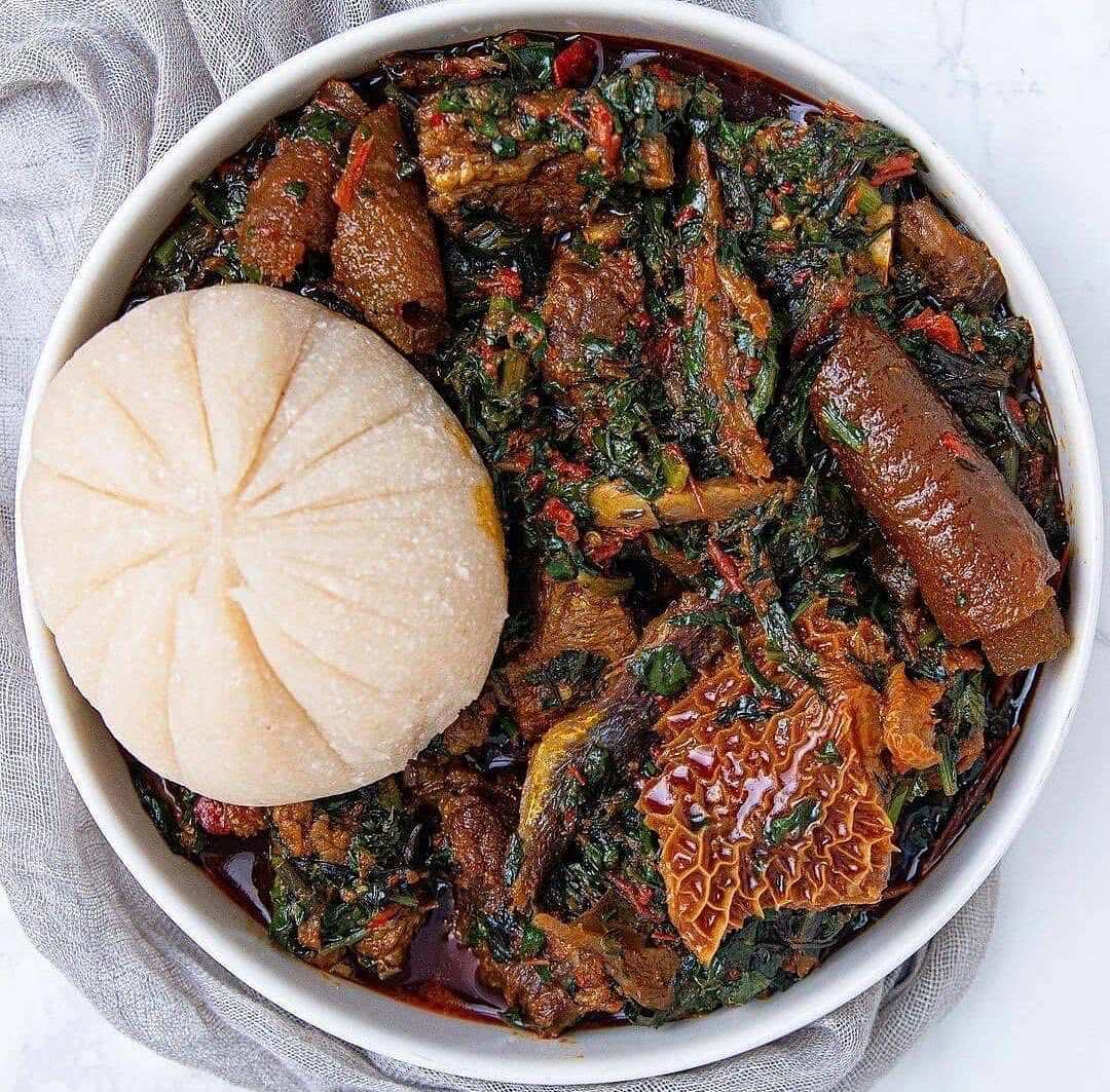 Edikang Ikong soup served with assorted meat and vegetables in Nigeria