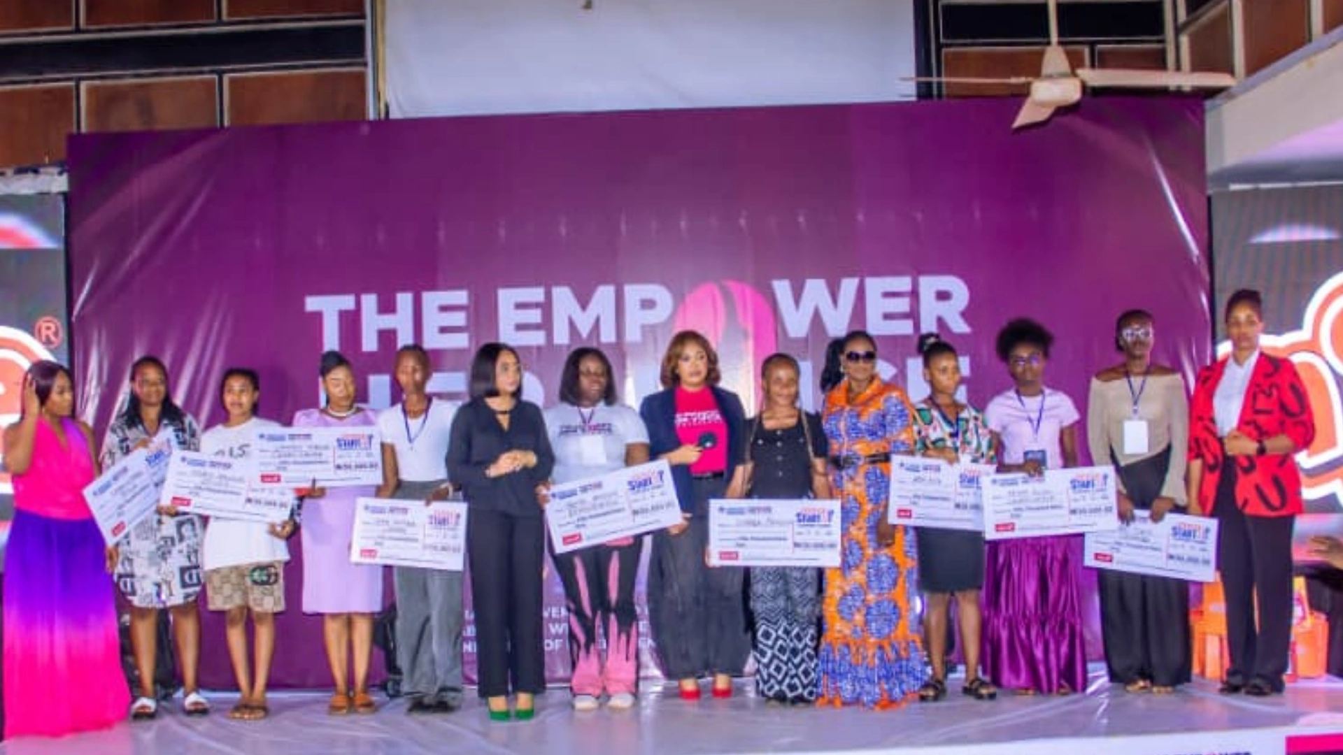Students receiving startup grants at Empower Her Voice Conference