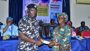 Lagos polie command handing cheques to families of fallen officers