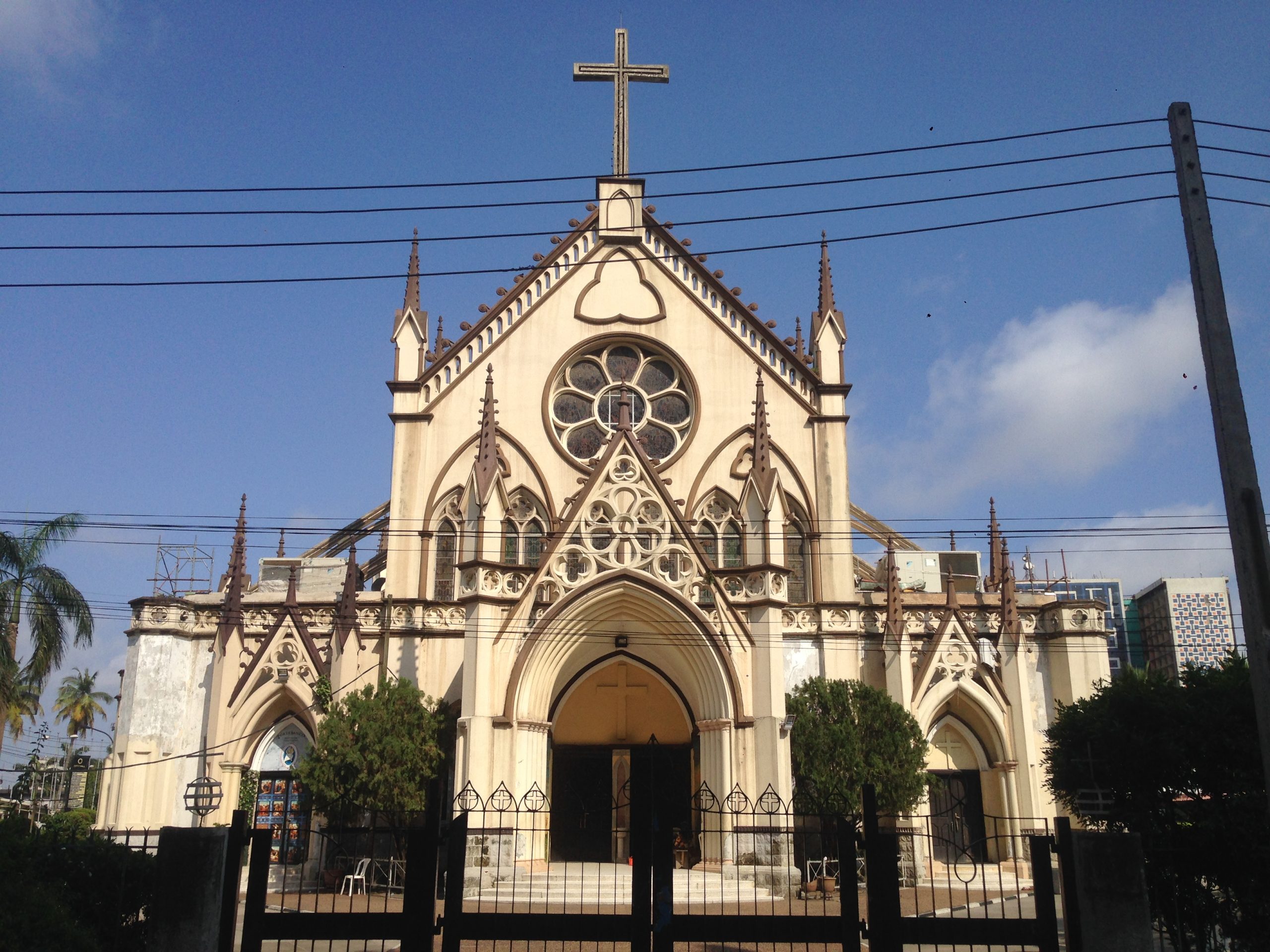 Cathedral of the Holy Cross Lagos Island exterior with tall towers and historic structure