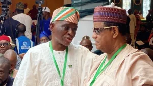 Mohammed Hayatu-Deen with Jide Adenij