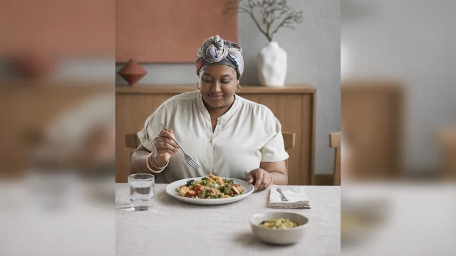 Woman enjoying a healthy balanced meal at home