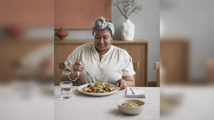Woman enjoying a healthy balanced meal at home