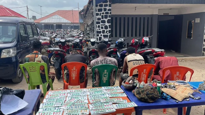 Suspects with recovered items.