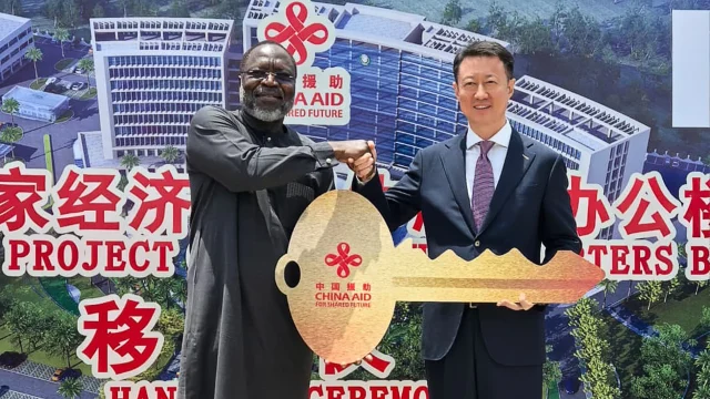 From left is the President, ECOWAS COMMISSION, Omar Aliu Touray receiving the symbolic let to the new ECOWAS COMMISSION Headquarters in Abuja from the Chinese Ambassador, Yu Dunhai.