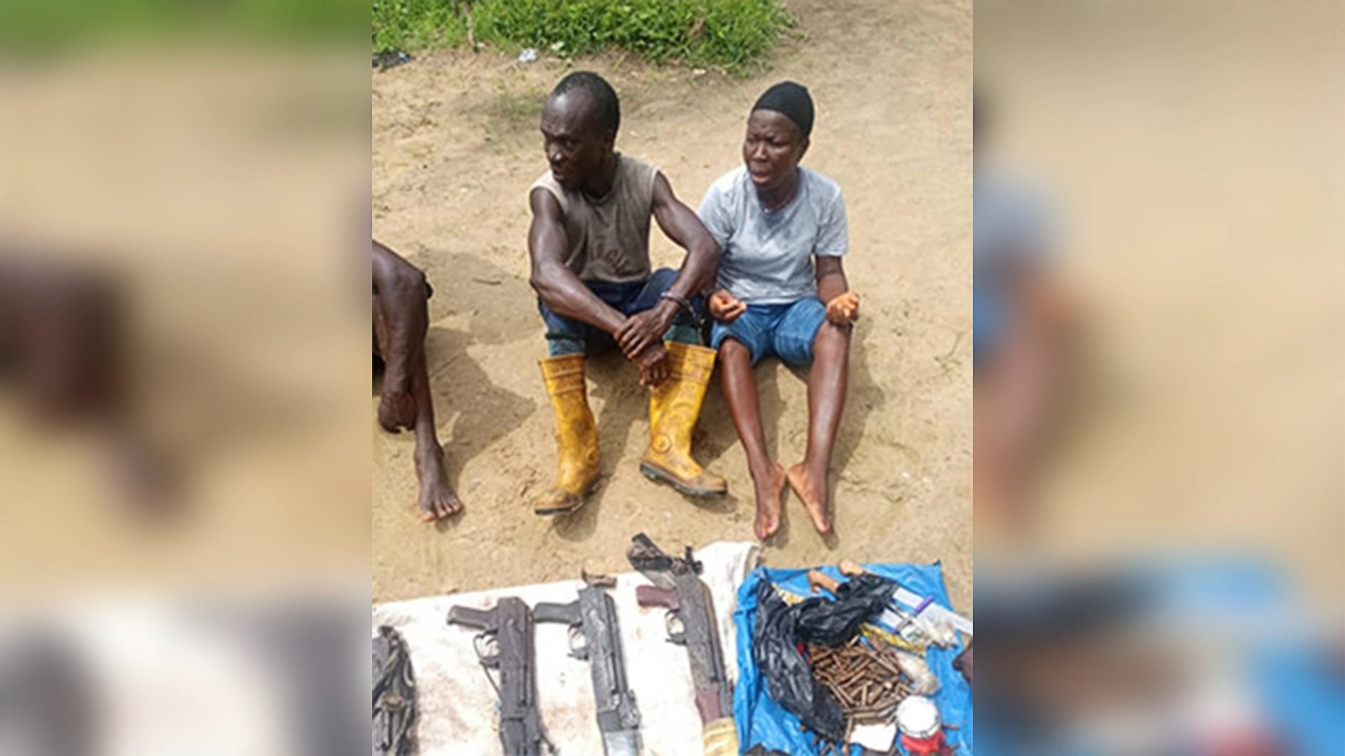 Suspects with recovered  arms and ammunition