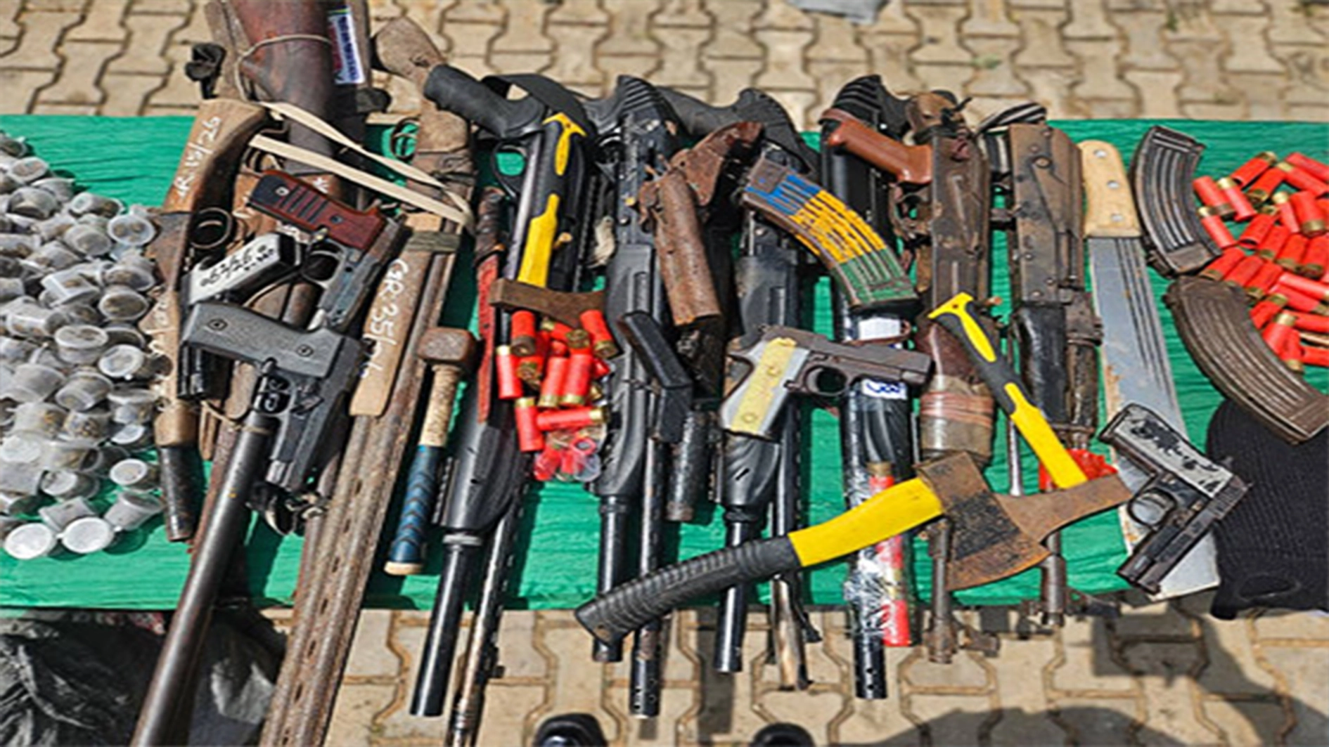 Recovered illicit drugs, arms and ammunition