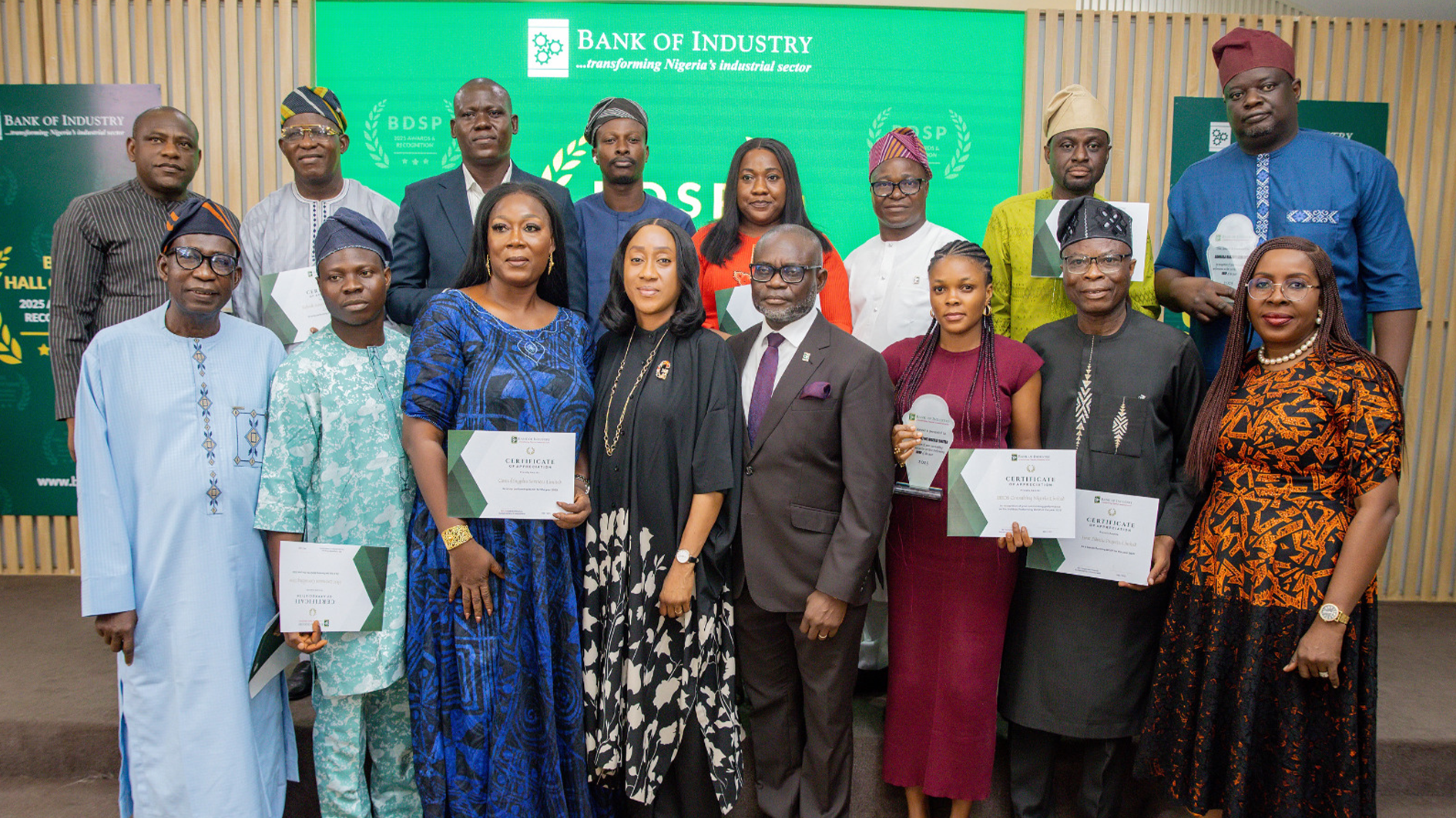 Back row: Chief Financial Officer, Bank of Industry (BOI), Taiwo Kolawole (left); flanked by Business Development Service Providers (BDSPs) and Divisional Head, Business Development and Partnerships, BOI, Obaro Osah (3rd right).Front row:Company Secretary, BOI, Olufunlola Salami (4th left); followed by Chief Strategy and Development Officer, BOI, Dr Isa Omagu (5th left) and Director-General of the Lagos Chamber of Commerce and Industry (LCCI), Dr Chinyere Almona (right), as well as other 2025 top performing BDSPs of BOI at an award ceremony in Lagos.