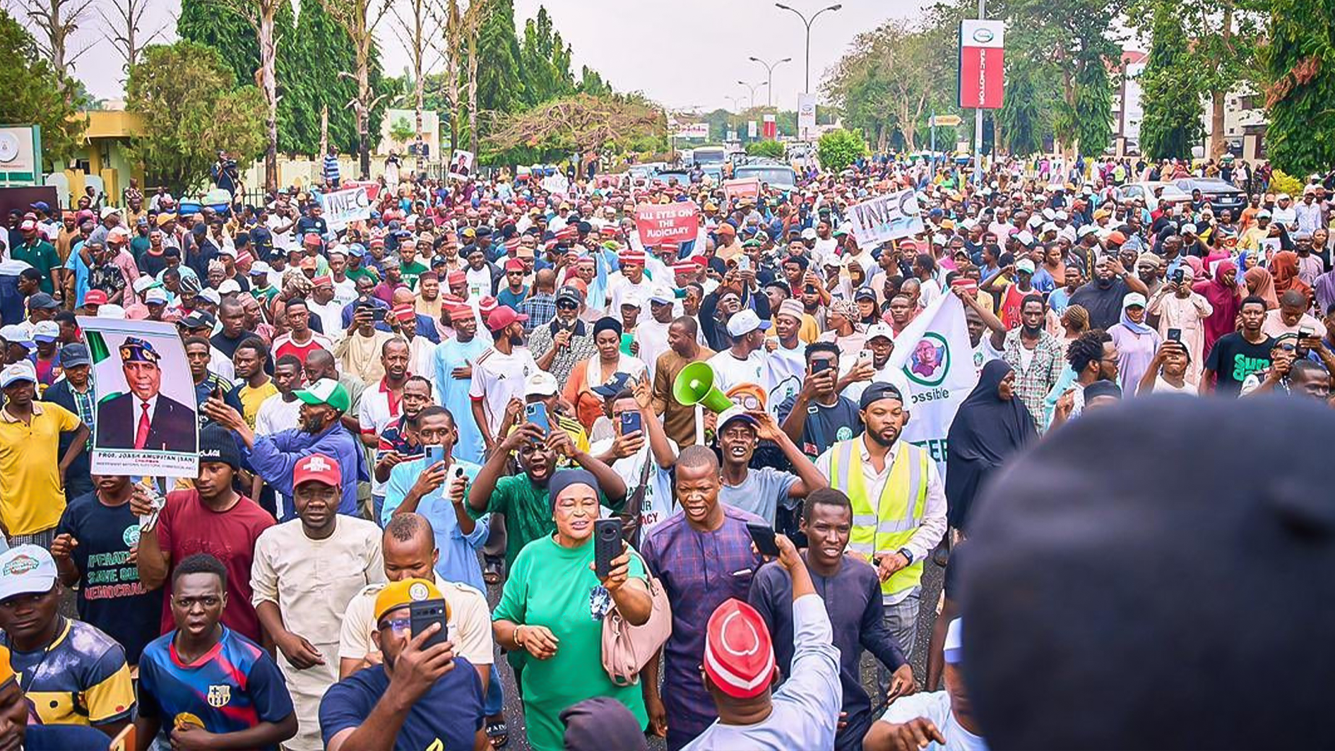 ADC leaders led by David Mark protest Independent National Electoral Commission, demand chairman Joseph Amupitan’s removal, urge Nigerians defend democracy, as lobbying firm seeks US sanctions.