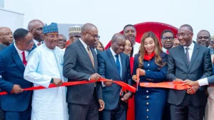 Dame Adaora Umeoji, Group Managing Director and Chief Executive Officer of Zenith Bank Plc cuts the ribbon to officially open the CIV branch