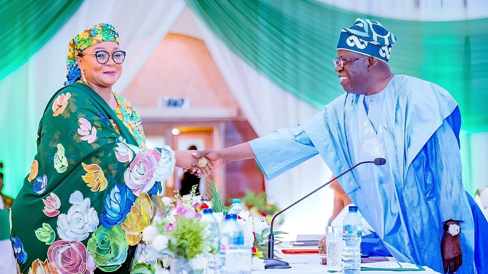 President Bola Tinubu shakes hands with the Minister of Women Affairs and Social Development, Imaan Sulaiman-Ibrahim, during a meeting at the State House in Abuja.