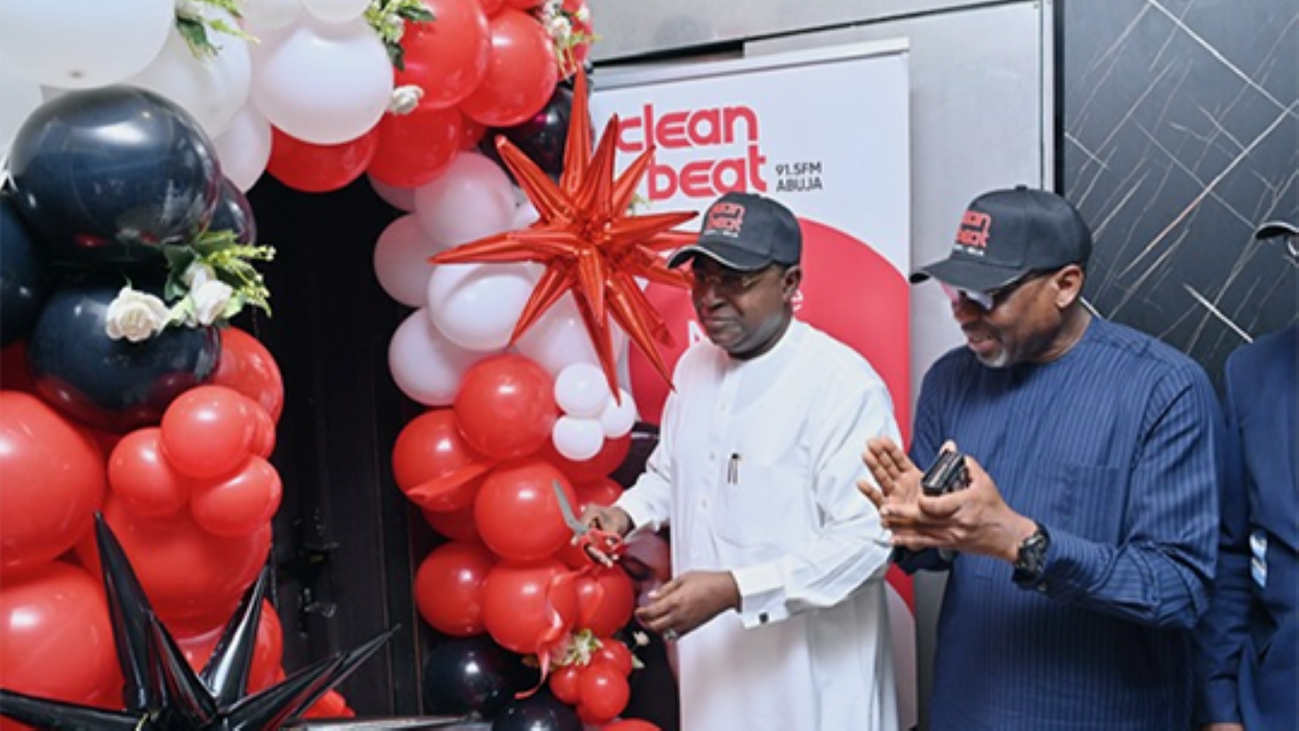 Brig Gen Marwa (Rtd) (left) and Director General of the National Broadcasting Commission (NBC), Mr Charles Ebuebu, during the official commissioning of the agency’s radio station in Abuja, yesterday.