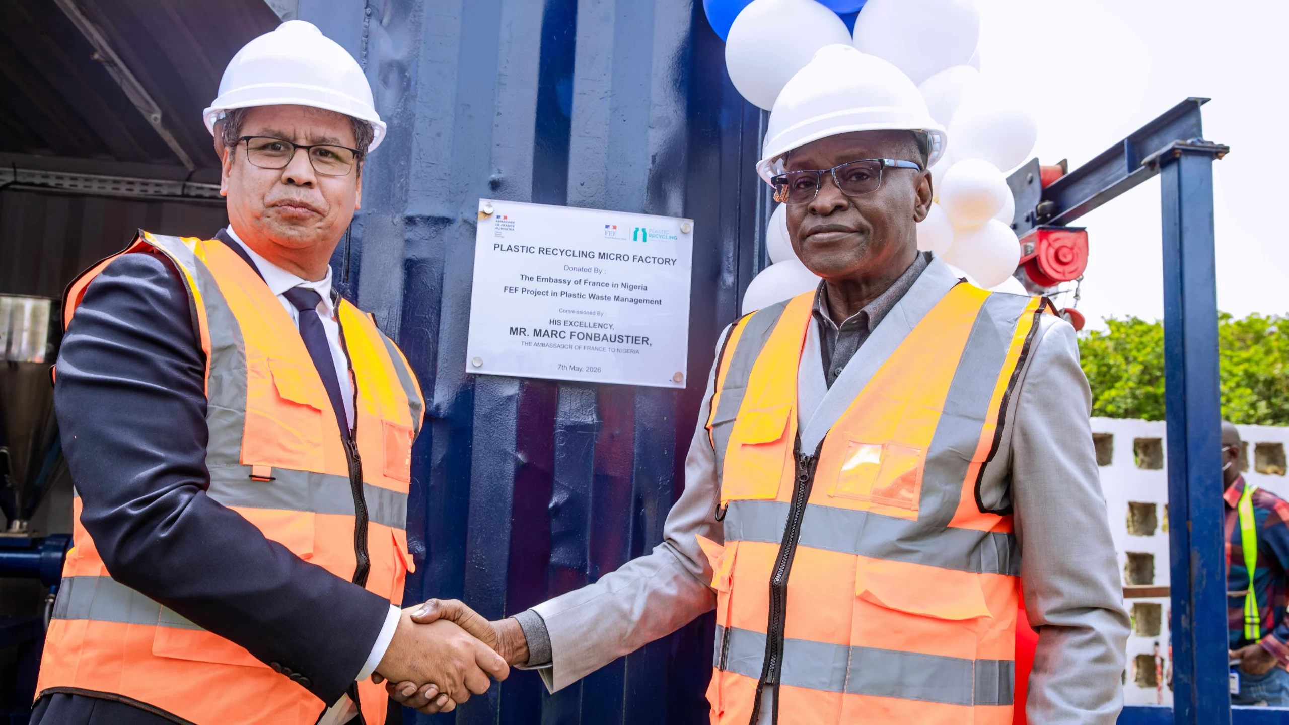 L-R: Mr. ANDRIAMAMPIANINA Pierre & Prof. Dilli Dogo, during the unveiling ceremony of the Plastic Recycling Micro Factory at Nile University of Nigeria