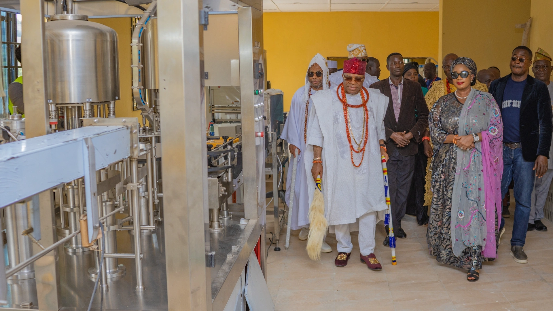 Oba Clement Adesuyi Haastrup, wife and other community leaders Inside the Ogere-Ekun Water Factory.