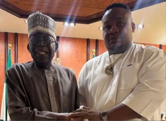 President Bola Ahmed Tinubu and Cubana Chief Priest..jpg