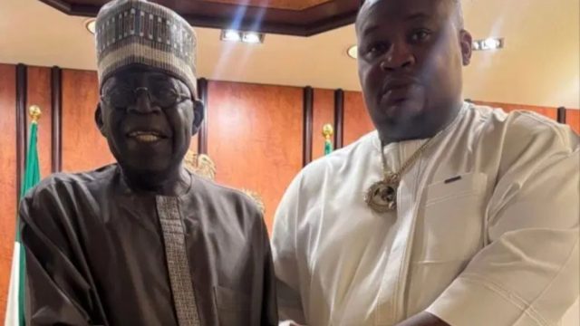 President Bola Ahmed Tinubu and Cubana Chief Priest..jpg