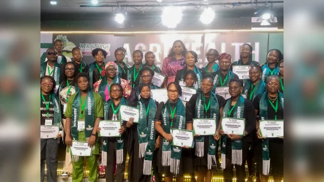 New Agri-wealth ambassadors, displaying their certificates after their official induction into the Xtra Large network during the summit