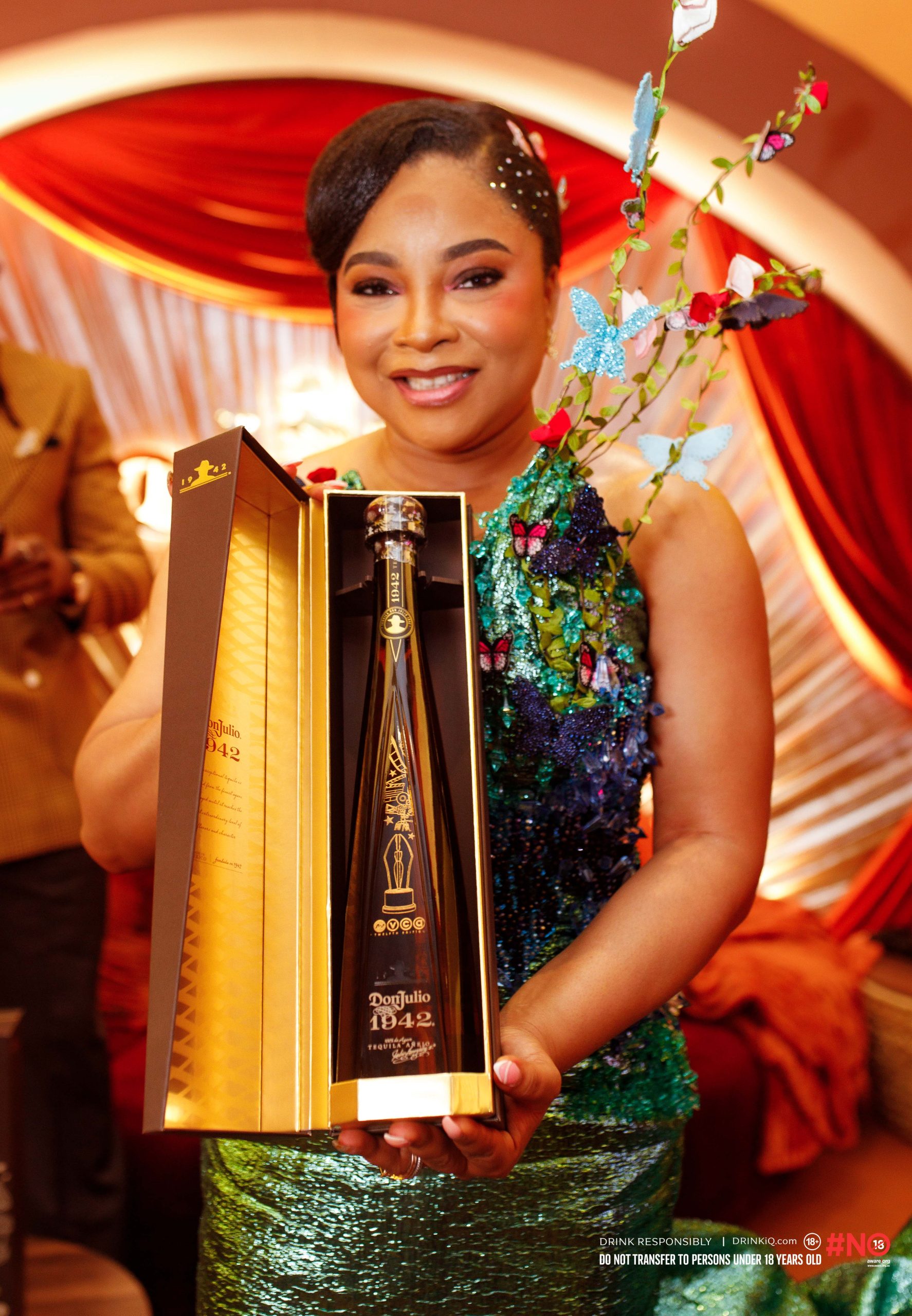 Linda Ihuoma Ejiofor-Suleiman with a Don Julio 1942 commemorative bottle at the 12th Africa Magic Viewers' Choice Awards in Lagos. Photo Don Julio Nigeria.