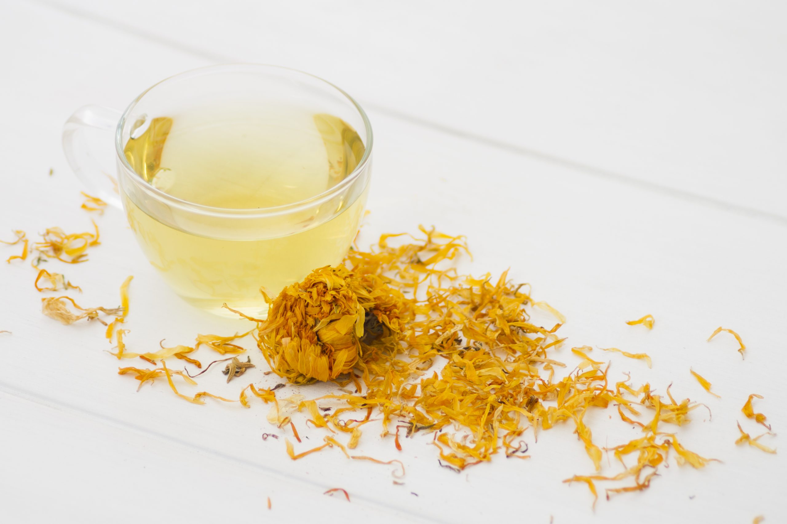 A warm cup of chamomile tea served in a ceramic mug, known for its calming properties, soothing aroma, and potential wellness benefits.
