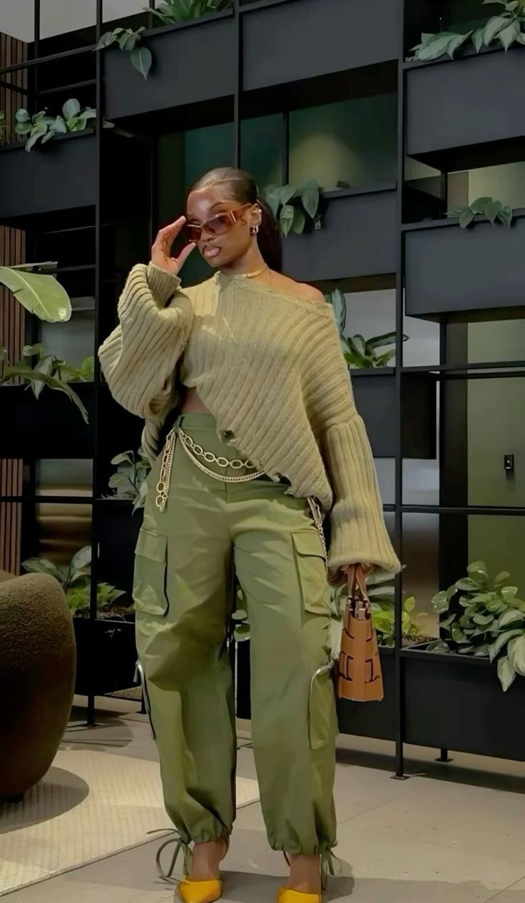 Fashionable cargo pants with multiple utility pockets, worn casually for a trendy streetwear look