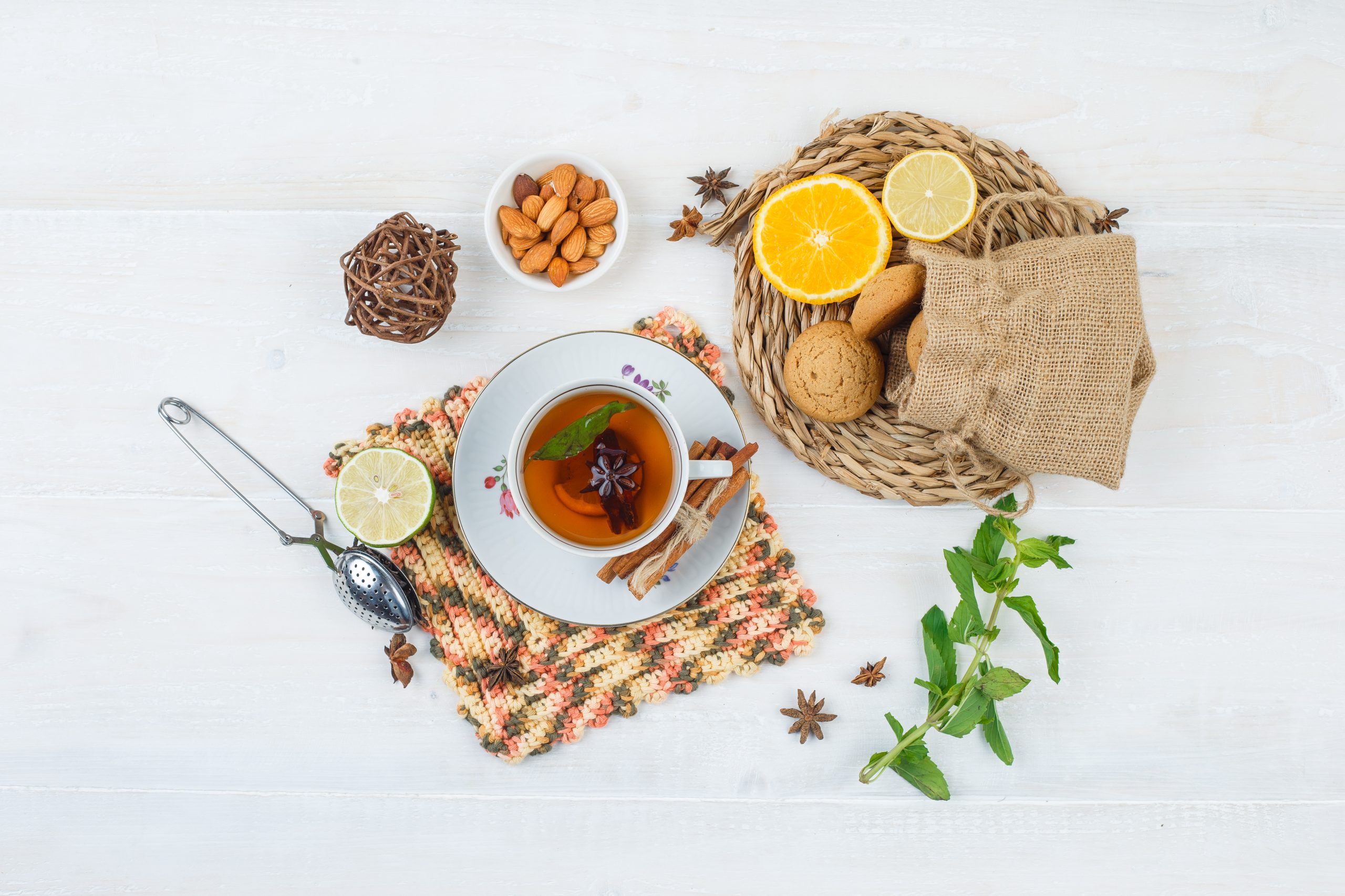 A warm cup of fruit tea served in a ceramic mug, known for its calming properties, soothing aroma, and potential wellness benefits.