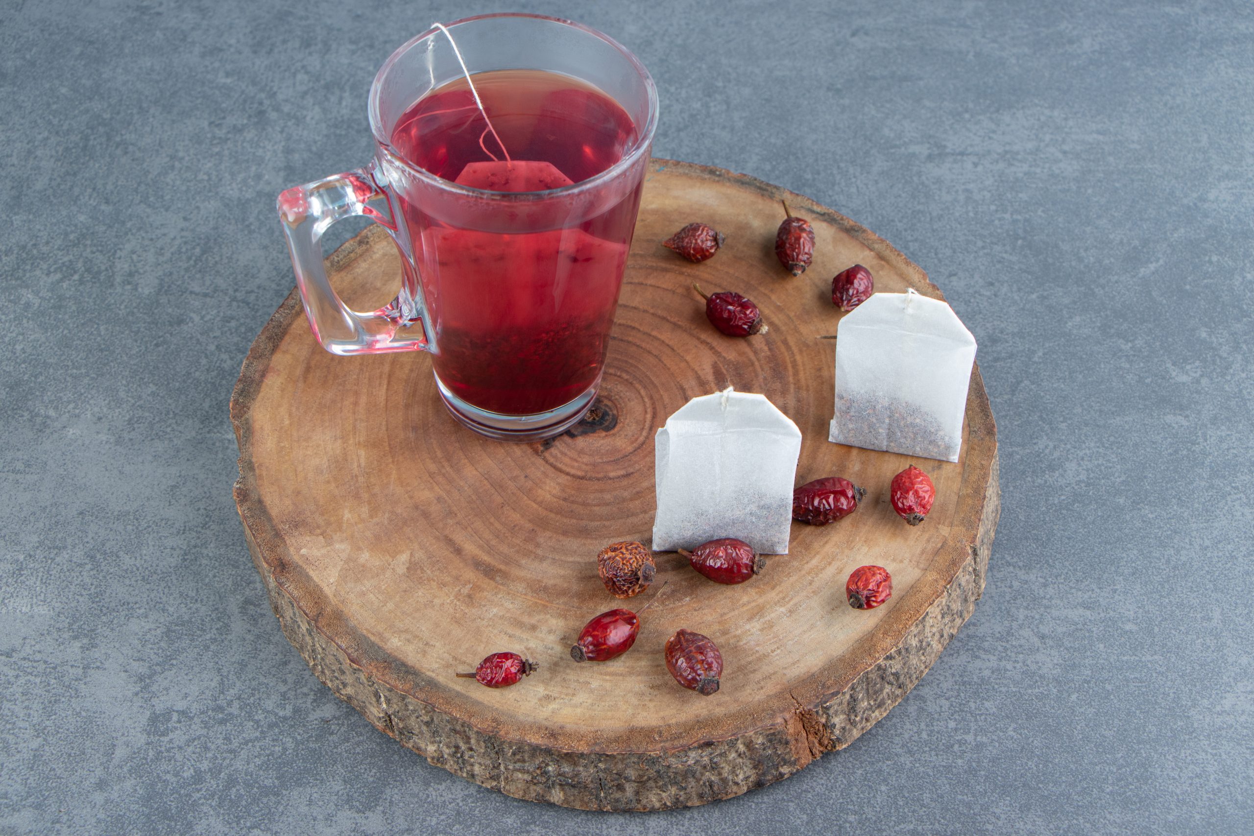 A warm cup of Hibiscus Tea served in a ceramic mug, known for its calming properties, soothing aroma, and potential wellness benefits.