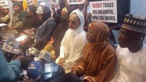 Families of military officers standing trial over an alleged plot to overthrow President Bola Tinubu