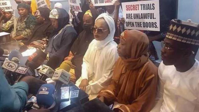 Families of military officers standing trial over an alleged plot to overthrow President Bola Tinubu