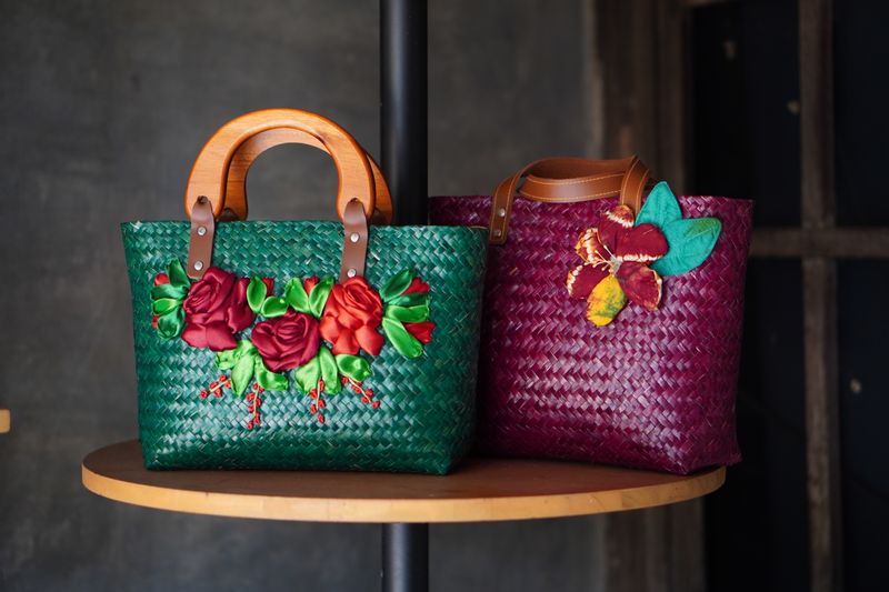Stylish straw bag with a textured pattern and elegant design, suitable for both casual and formal wear.