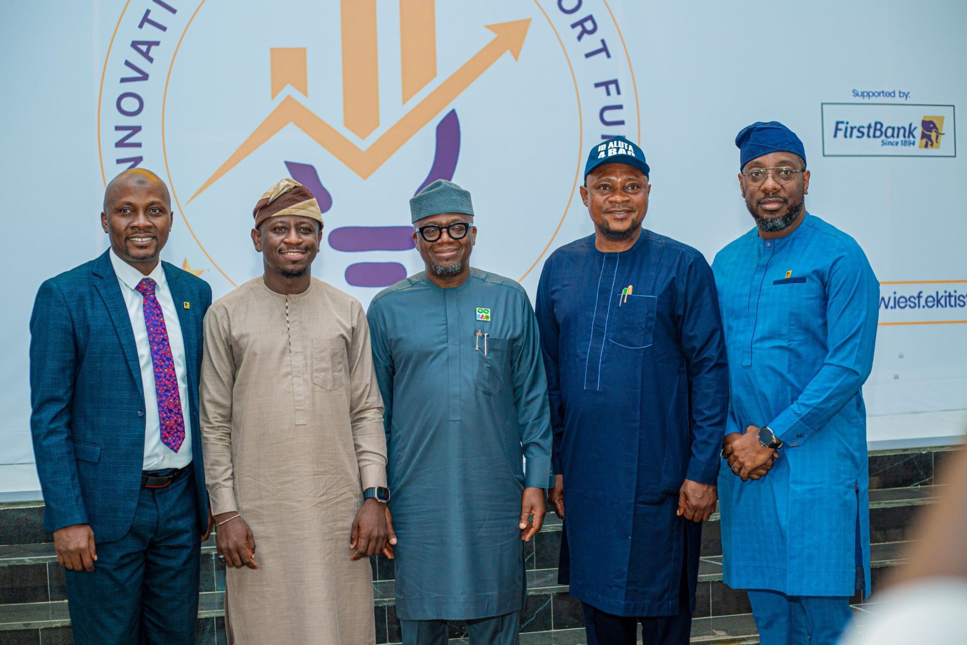 L-R: Adebayo Yacoub – Business Manager, Public Sector Directorate, who represented the First Bank CEO; Oluwaseun Fakuade -Honourable Commissioner for Innovation, Science and Digital Economy, Ekiti State; Oyeniyi Adebayo – Chief of Staff to the Governor of Ekiti State; Hon. Idowu Odebunmi, Chairman, State House Committee on Youth Development and ICT; Ayodeji Aina – Head, Enterprise Innovation Department, First Bank at the IESF disbursement ceremony in Ekiti.