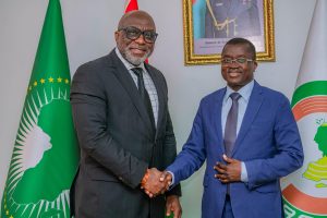 Chairman of United Nigeria Airlines, Chief Obiorah Okonkwo (left) with the Minister of Transport, Telecommunications and Digital Economy, Dr Florentino Pereira, representing the government of Guinea Bisau