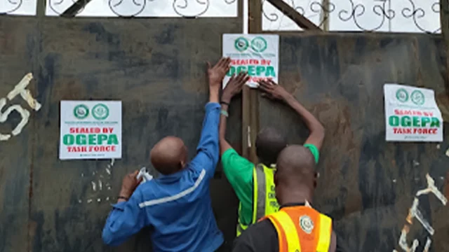 Ogun officials sealing the firm.